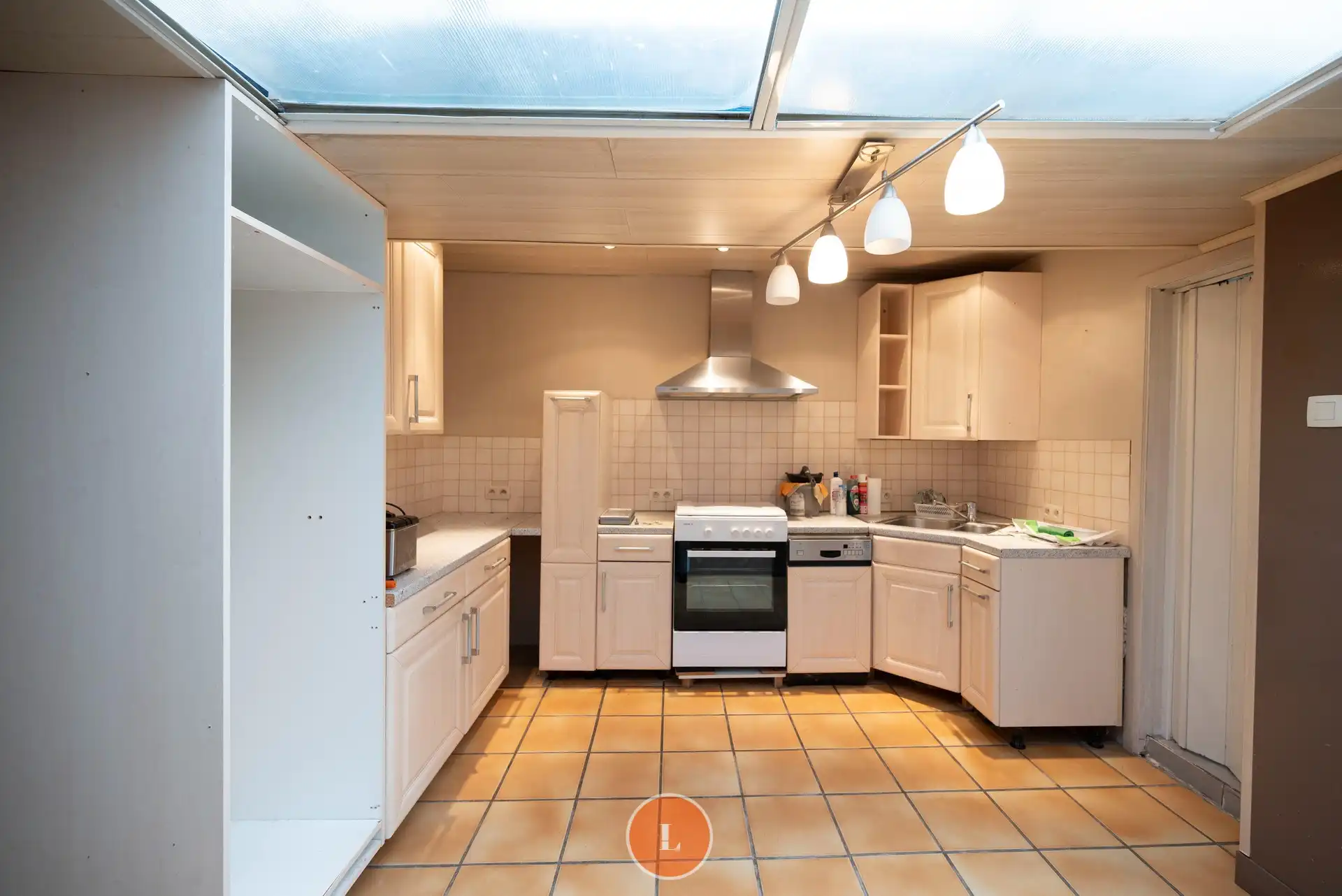 Te renoveren woning met veel potentieel en tuin in Menen foto 5