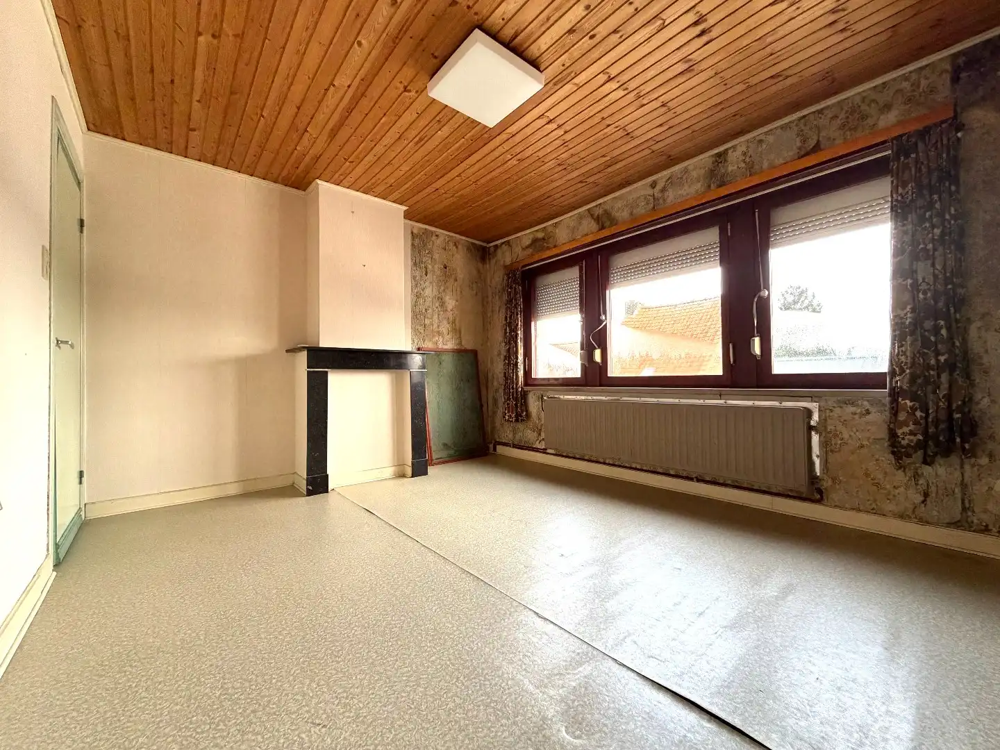 Te renoveren rijwoning met 4 slaapkamers en tuin in Kortrijk foto 12