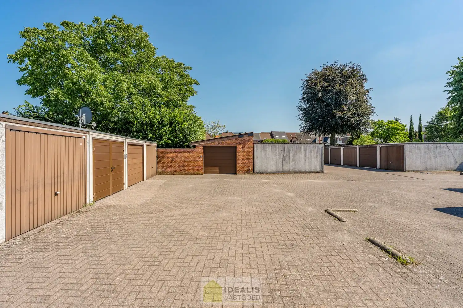 IDEALIS VASTGOED – GELIJKVLOERS APPARTEMENT MET LICHTRIJKE LEEFRUIMTE EN AANSLUITEND RUIME KEUKEN, BADKAMER, 2 SLAAPKAMERS EN GARAGEBOX OP EEN UITERST GUNSTIGE LOCATIE VLAK BIJ HET CENTRUM VAN PELT! foto 26