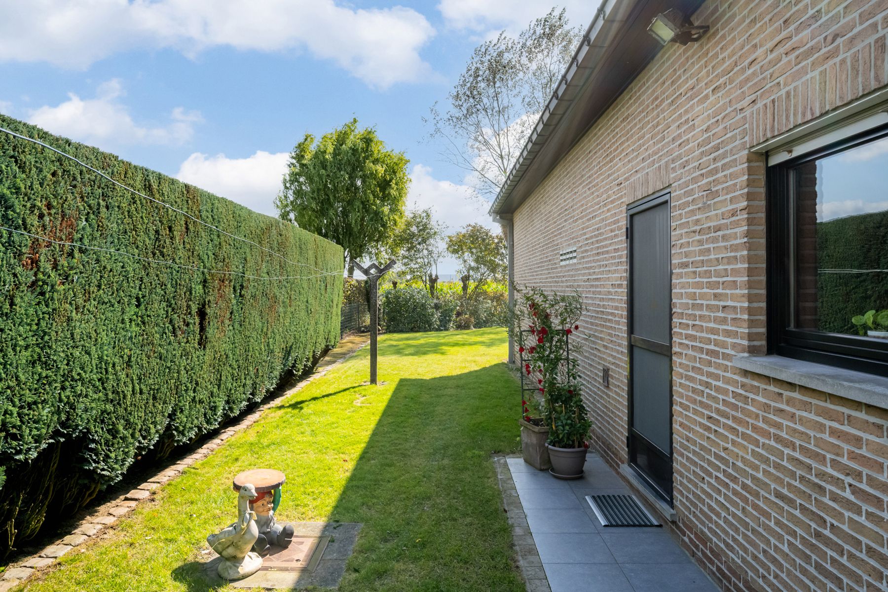 Ruime woning met OPTIE aankoop bouwgrond ernaast foto 19