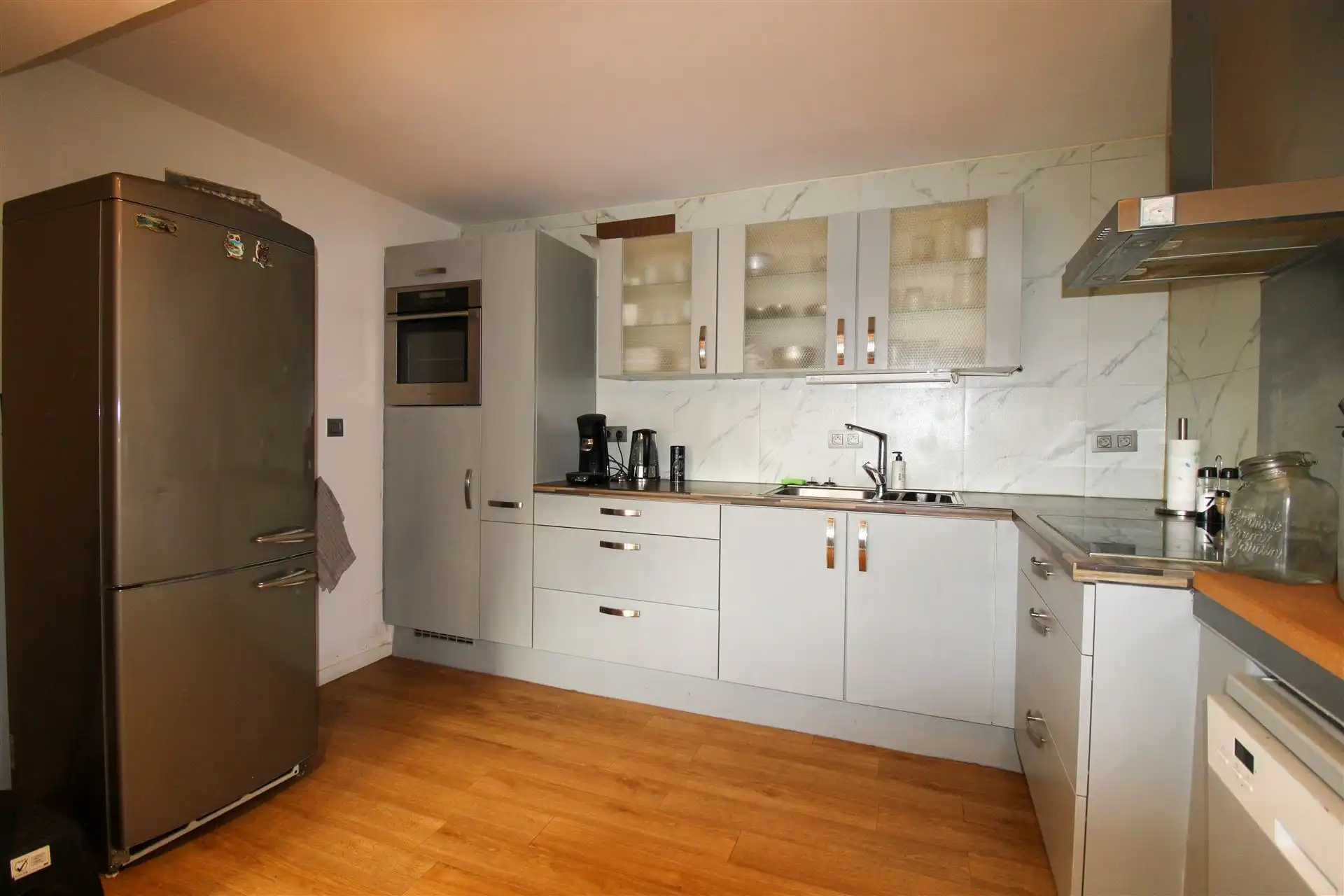 Charmante woning in Maasmechelen met 2 slaapkamers (mogelijkheid tot 3de), ruime oprit, tuin en veel potentieel, ideaal als renovatieproject! foto 6