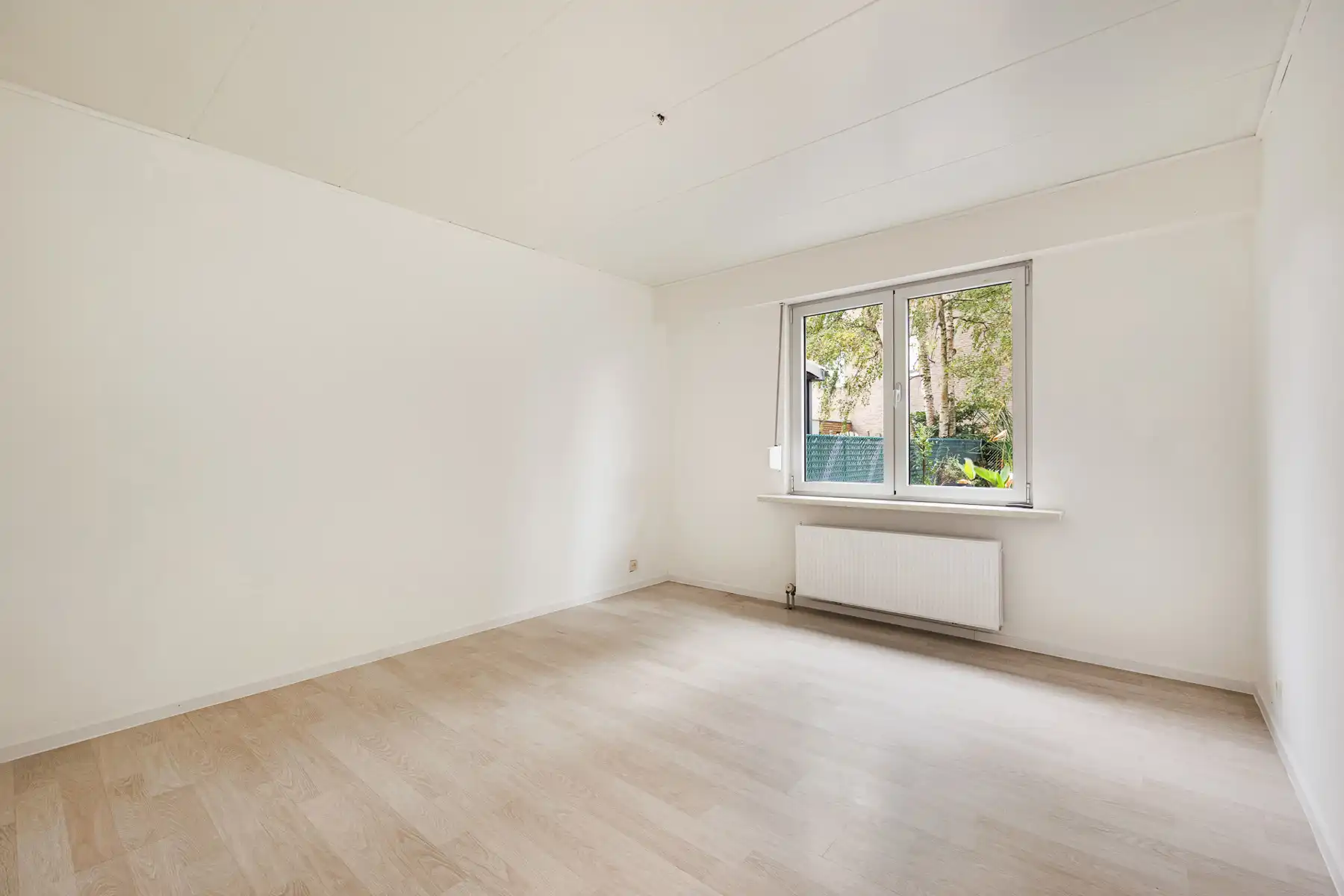 Gelijkvloersappartement met 2 slaapkamers, tuin en garagebox foto 8
