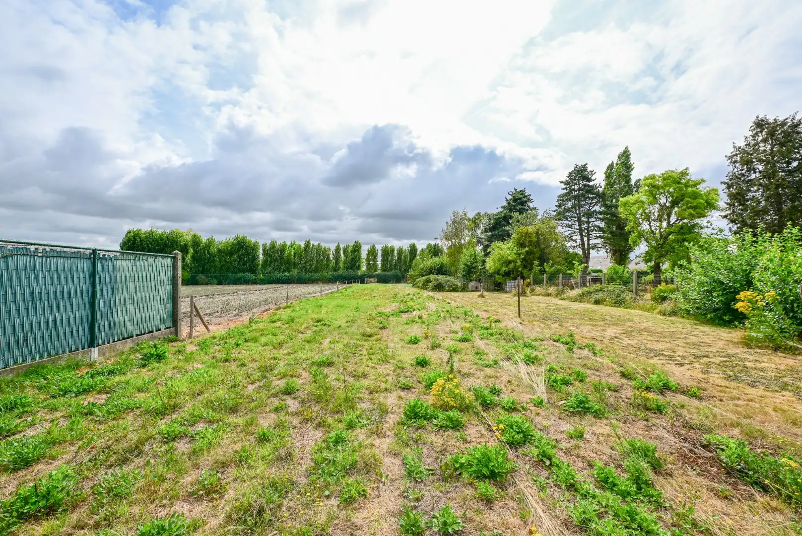 Bouwgrond met af te breken woning op 1100m2 te Zwevezele foto 6