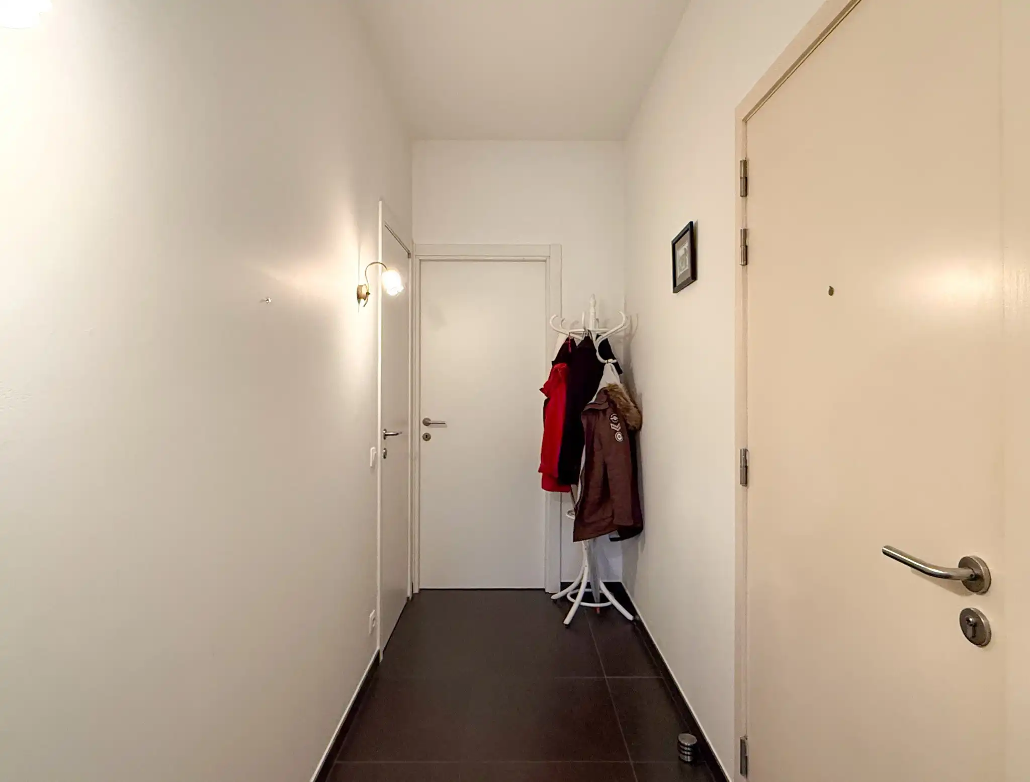 Appartement met zicht op de Grote Markt  met 1 slaapkamer, 2 terrassen en autostaanplaats foto 3