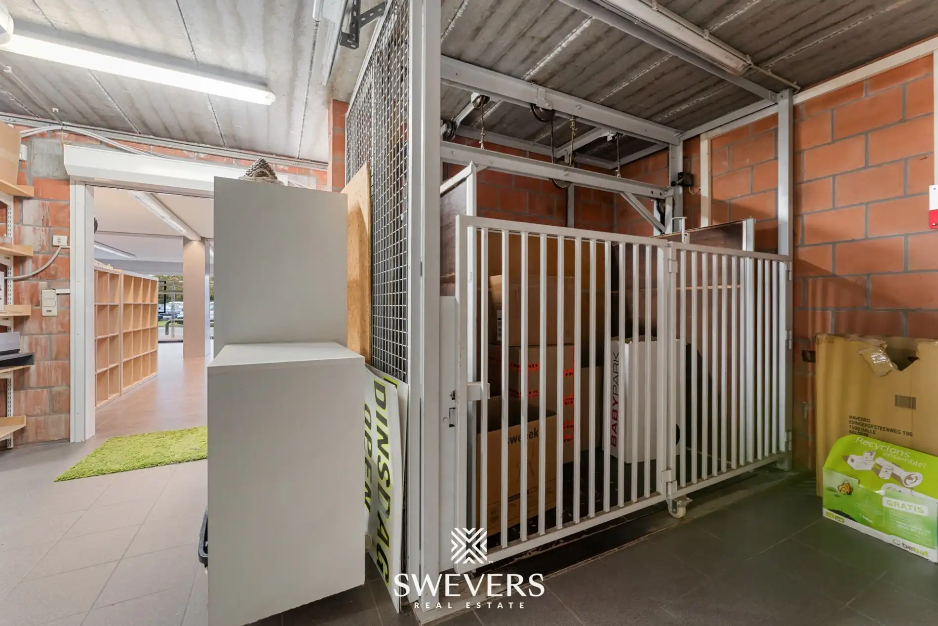 Opbrengsteigendom met handelspand, ruim appartement en uitbreidingspotentieel in hartje Heusden-Zolder foto 14