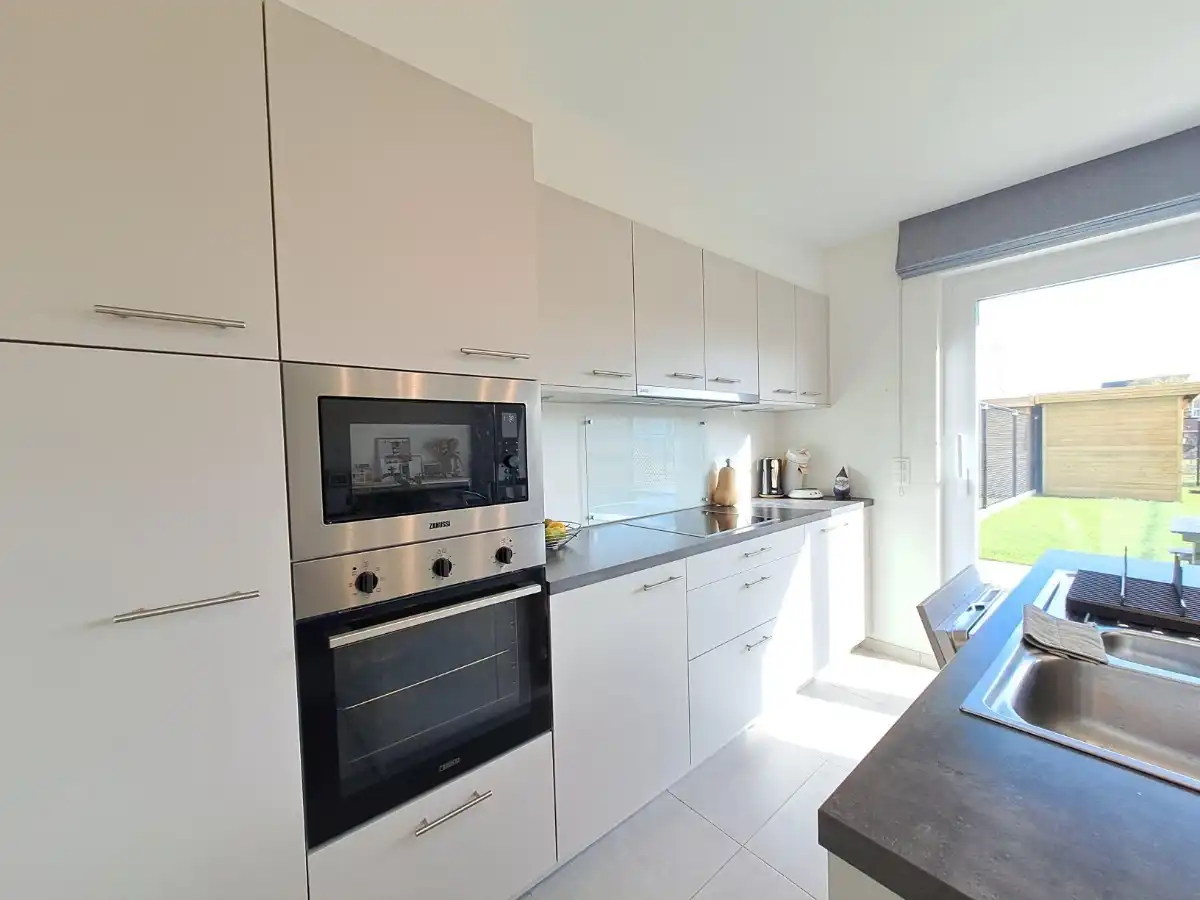 Energiezuinige en instapklare woning met 3 slaapkamers in Leanderhof te Zwevegem! foto 7