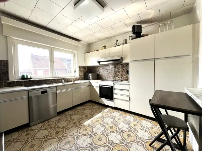 Ruim en karaktervol app. met 2 slaapkamers en garage foto 7