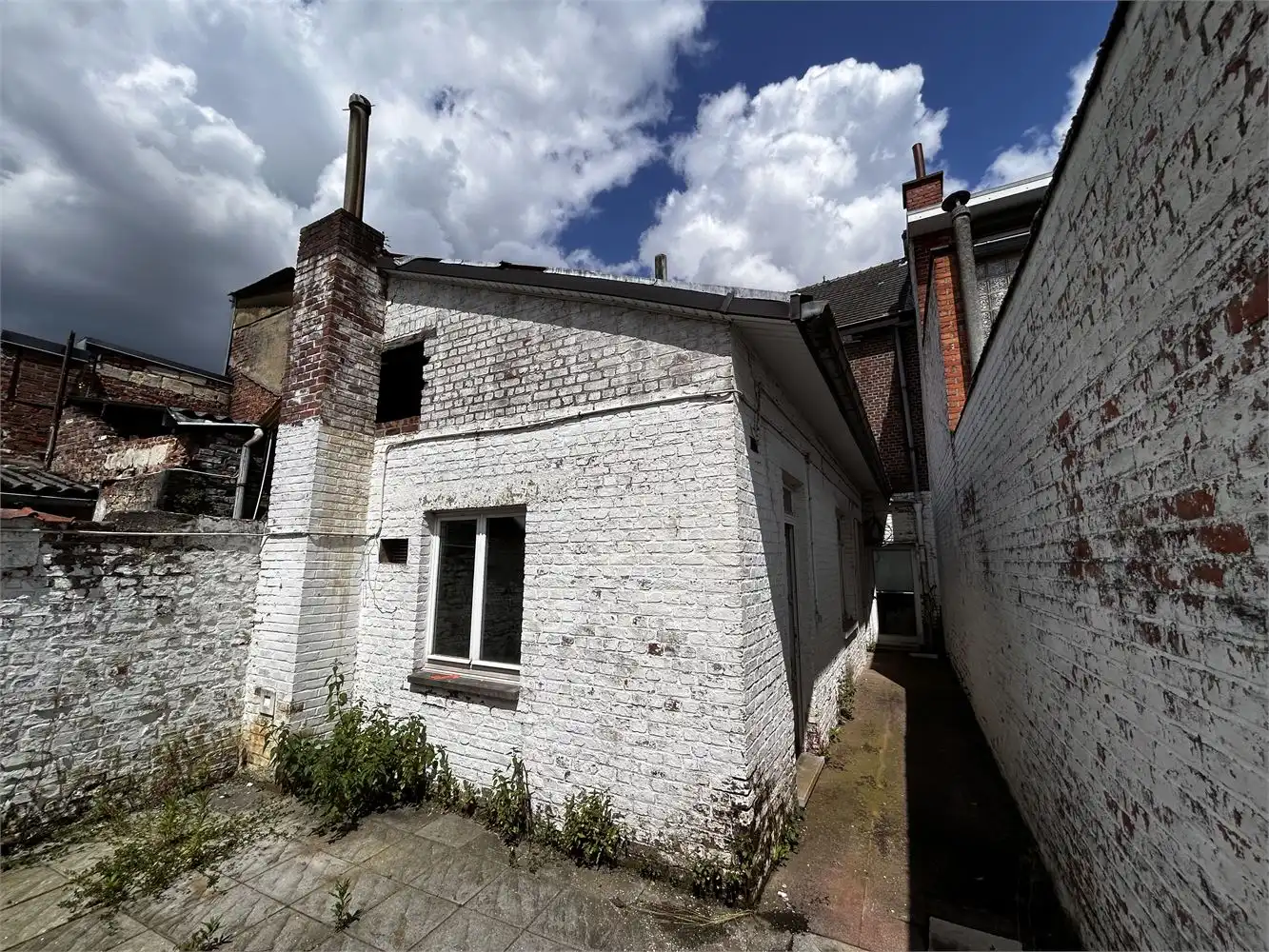 Te renoveren handelshuis met woonst foto 20