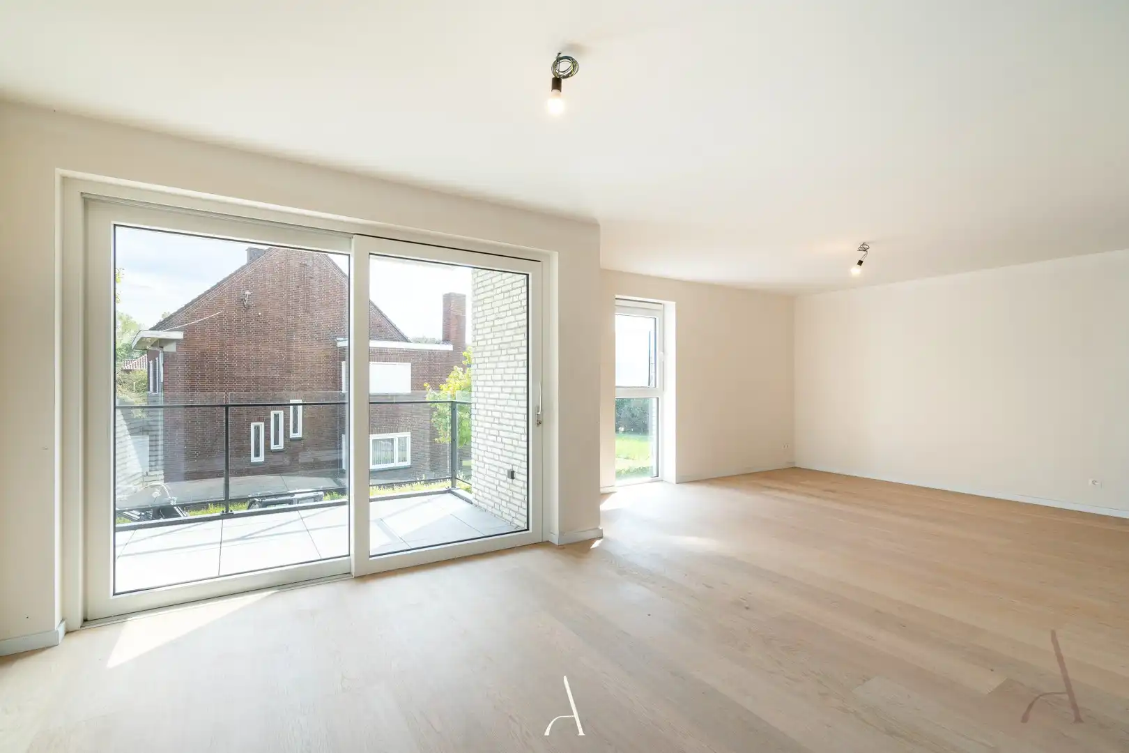 Te huur - Recent en energiezuinig 2-slaapkamerappartement met ondergrondse autostandplaats foto 4