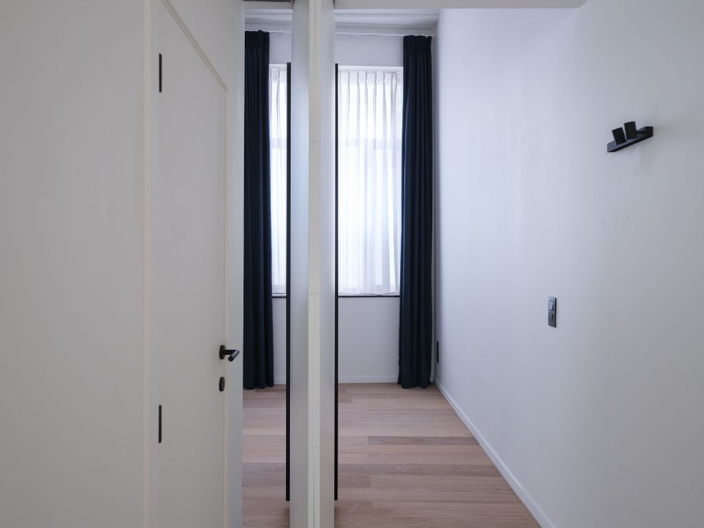 Toplocatie Centrum Gent – Stijlvol en ruim gerenoveerd appartement met één slaapkamer en buitenruimte. foto 8