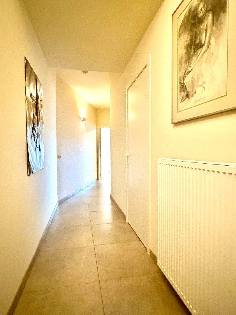 Hedendaags gelijkvloers appartement in centrum Kuurne. foto 9