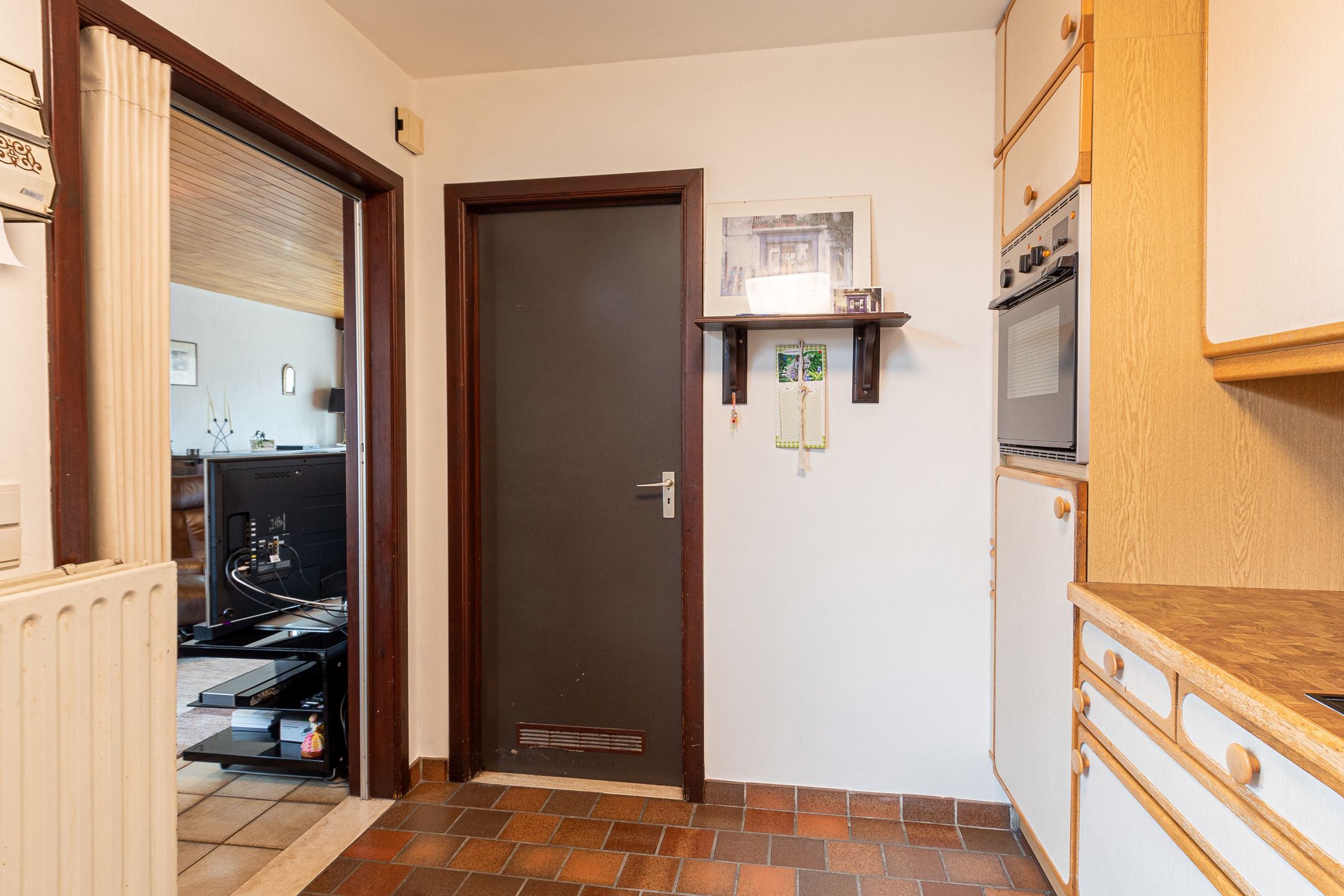 Gezellige gezinswoning in rustige wijk met uitweg en garage foto 10
