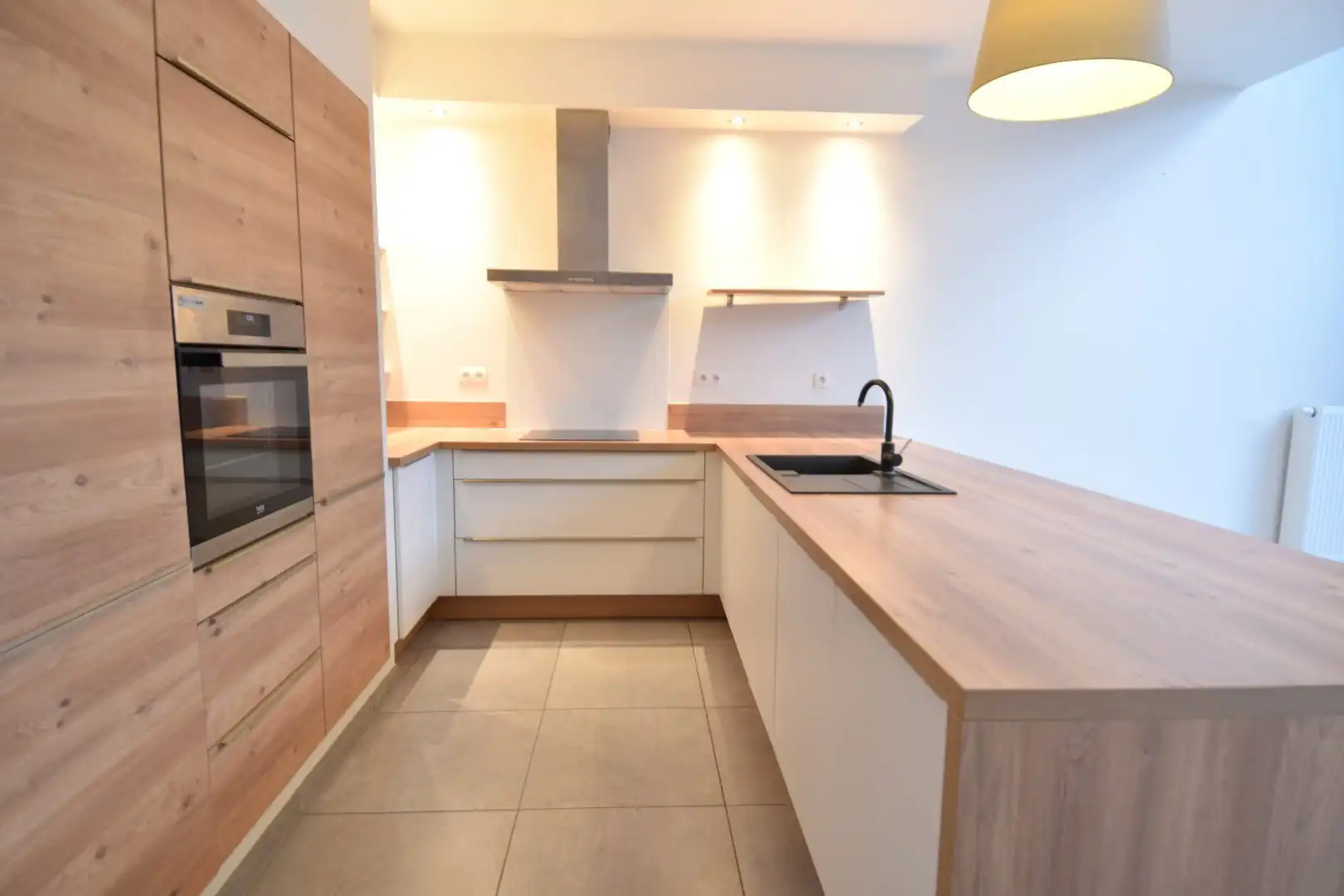 Rijwoning met 3 slaapkamers en tuin in Kortrijk foto 3