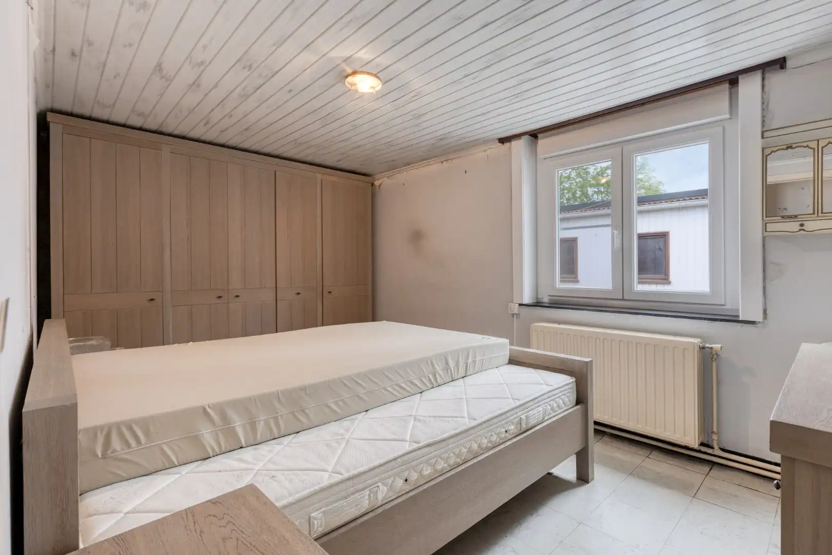 Rustig gelegen gelijkvloerse woning met 3 slaapkamers, garage en zonnige buitenruimte! foto 9