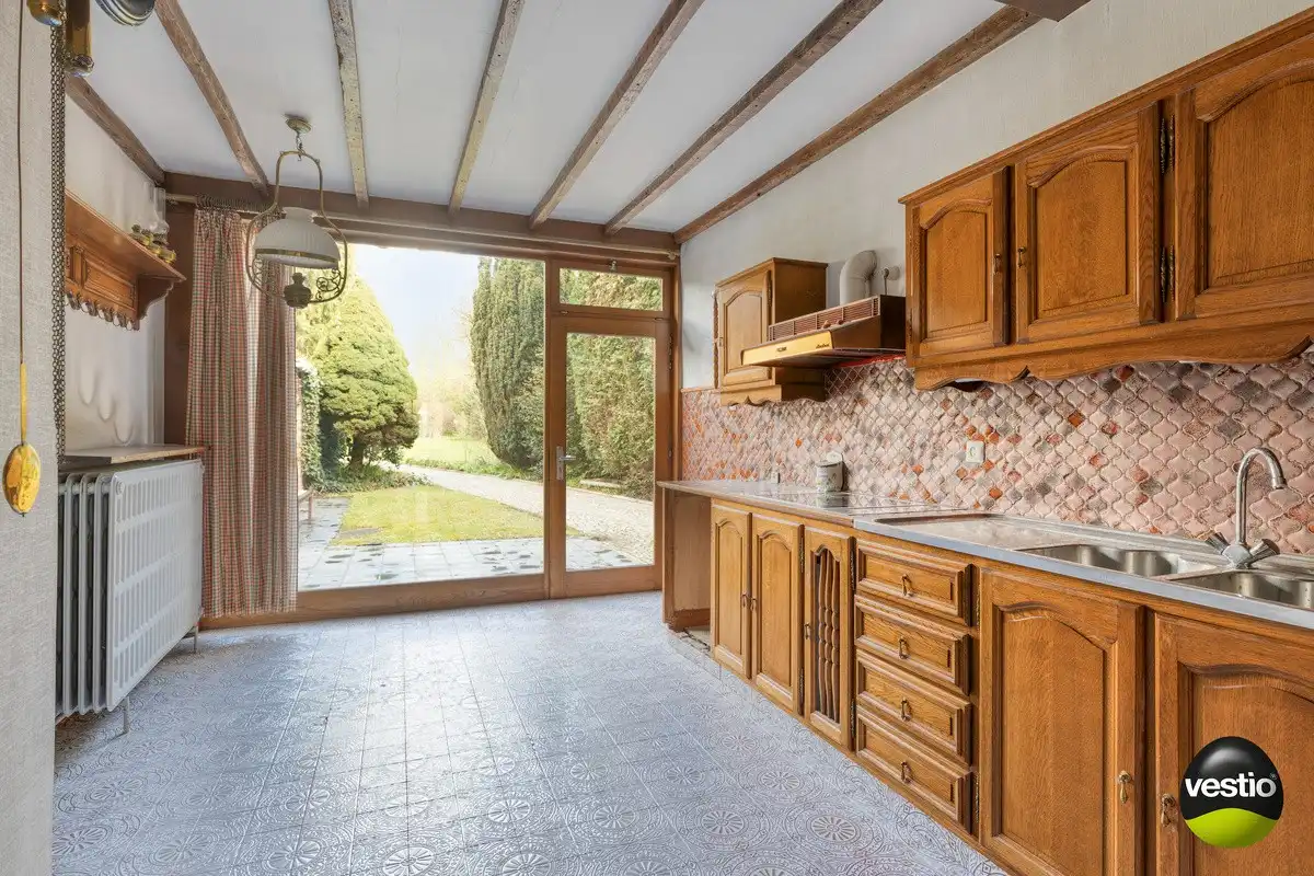 TE RENOVEREN WONING MET 3 SLAAPKAMERS EN GARAGE OP EEN RUIM PERCEEL VAN  8A 29CA IN HARTJE NIEUWERKERKEN foto 14