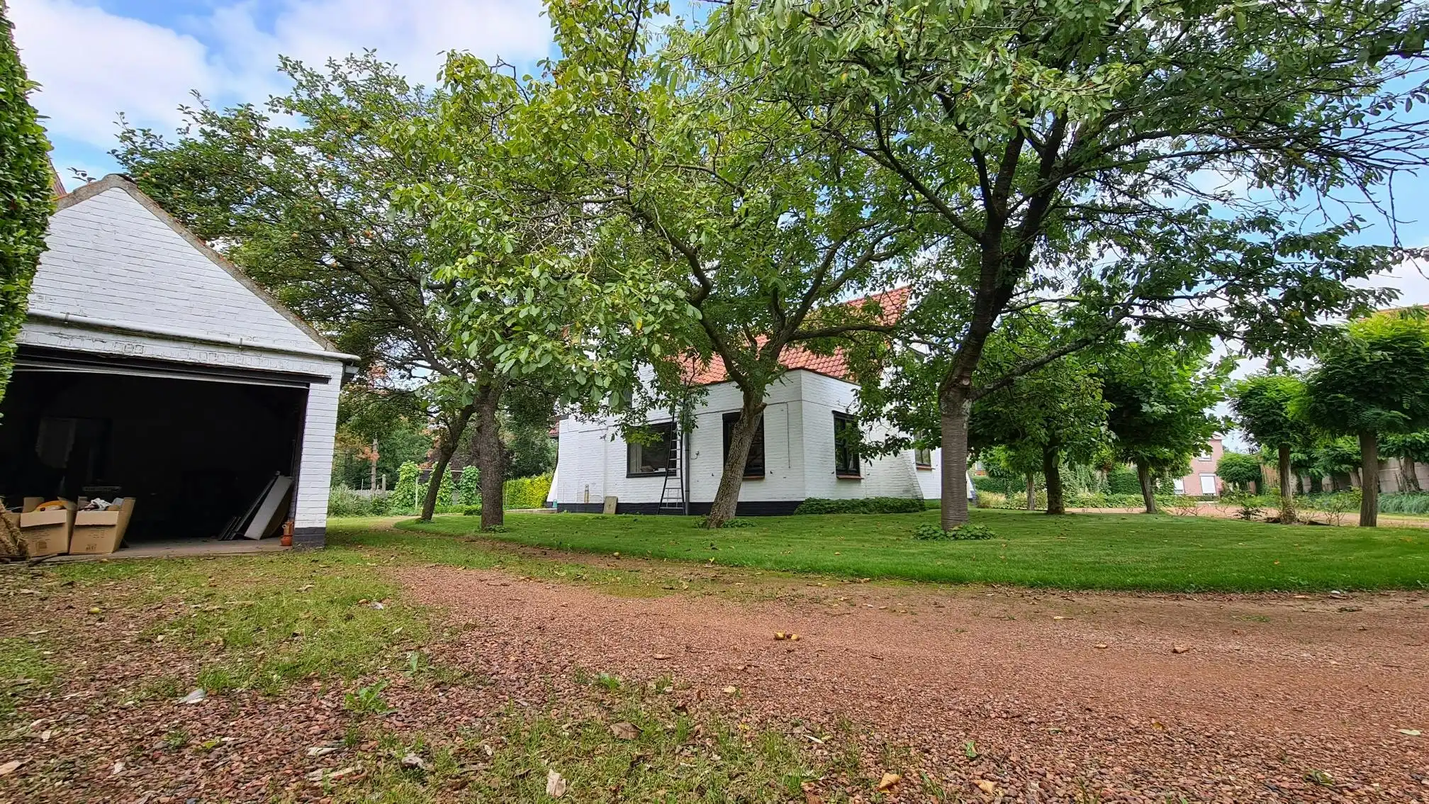 Villa met bouwgrond te koop in centrum Deerlijk foto 9