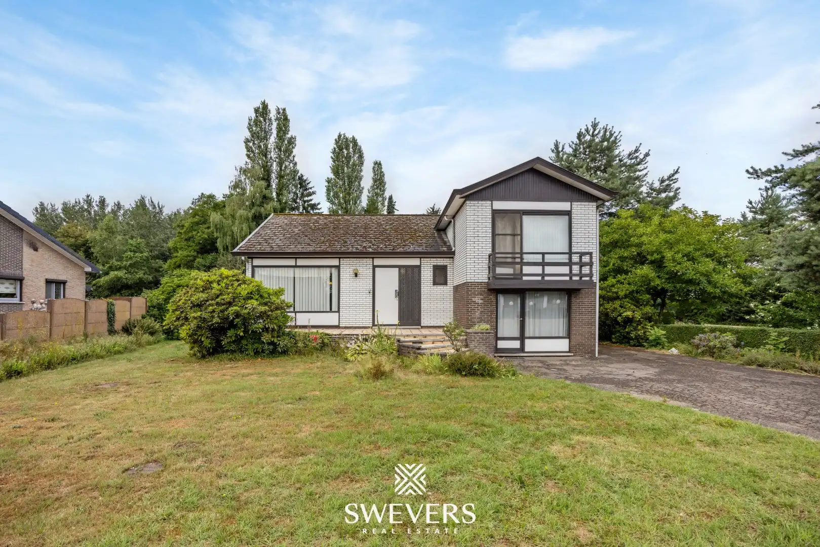 Hoofdfoto van de publicatie: Praktische, alleenstaande woning gelegen op een perceel van 21a 08ca in Heusden-Zolder