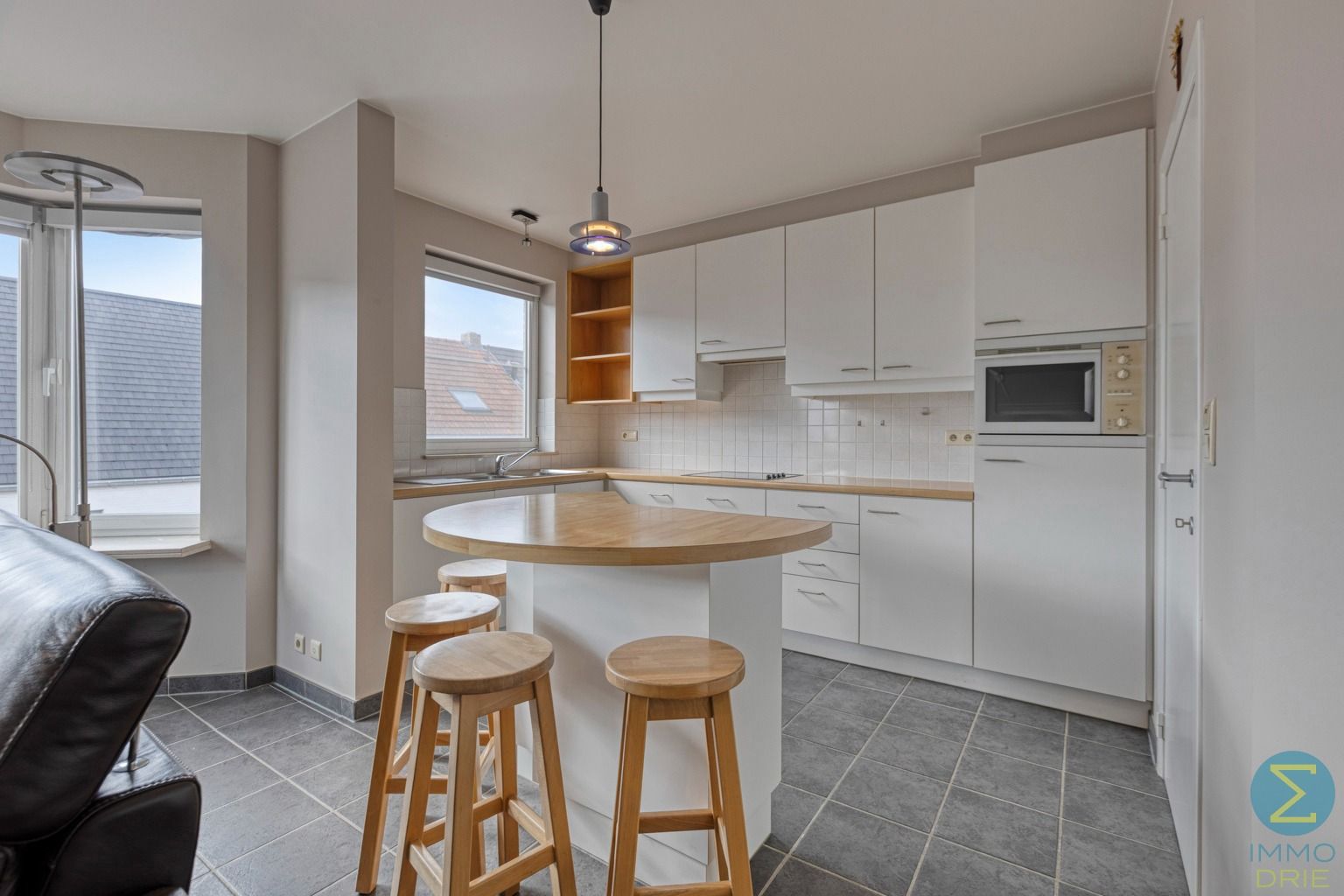 Ruim 2-slaapkamerappartement met balkon, garage én kelder  foto 8