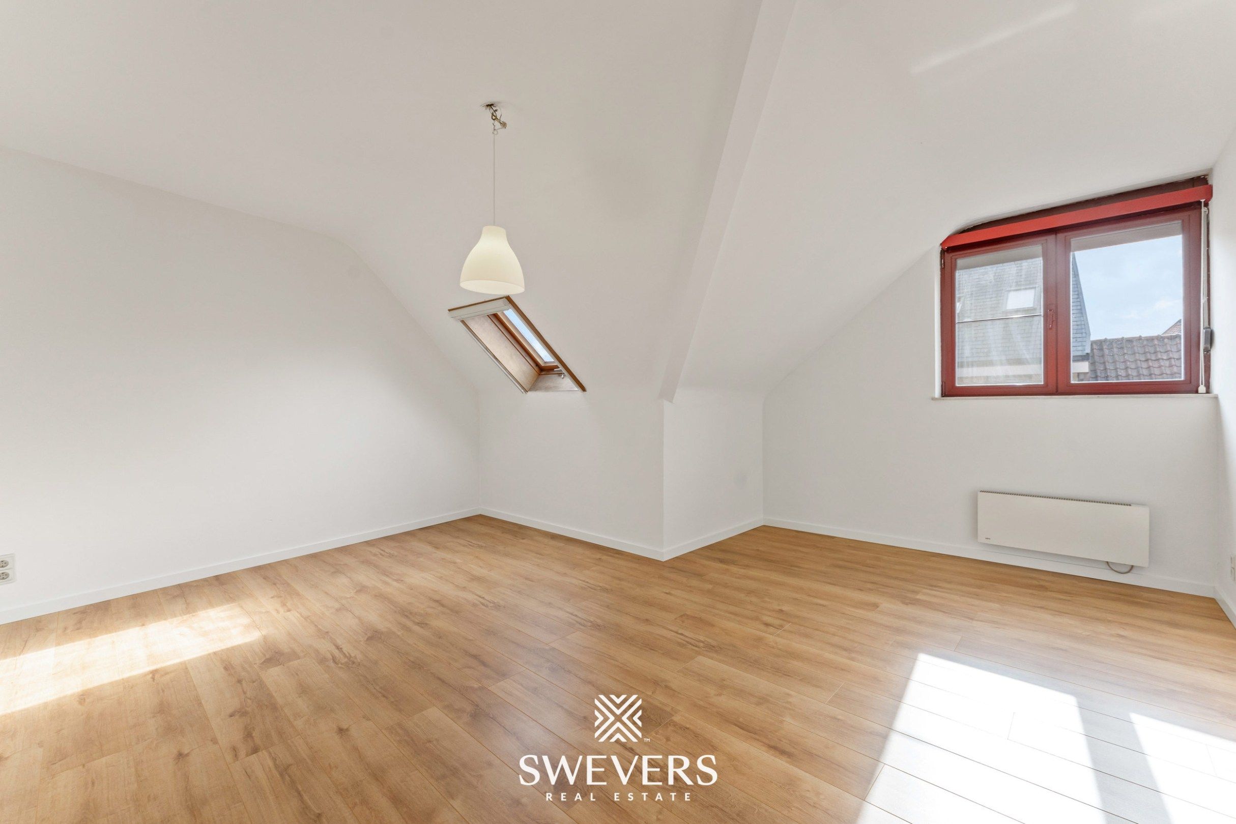 Instapklaar en lichtrijk duplexappartement in centrum Herk-de-Stad foto 22