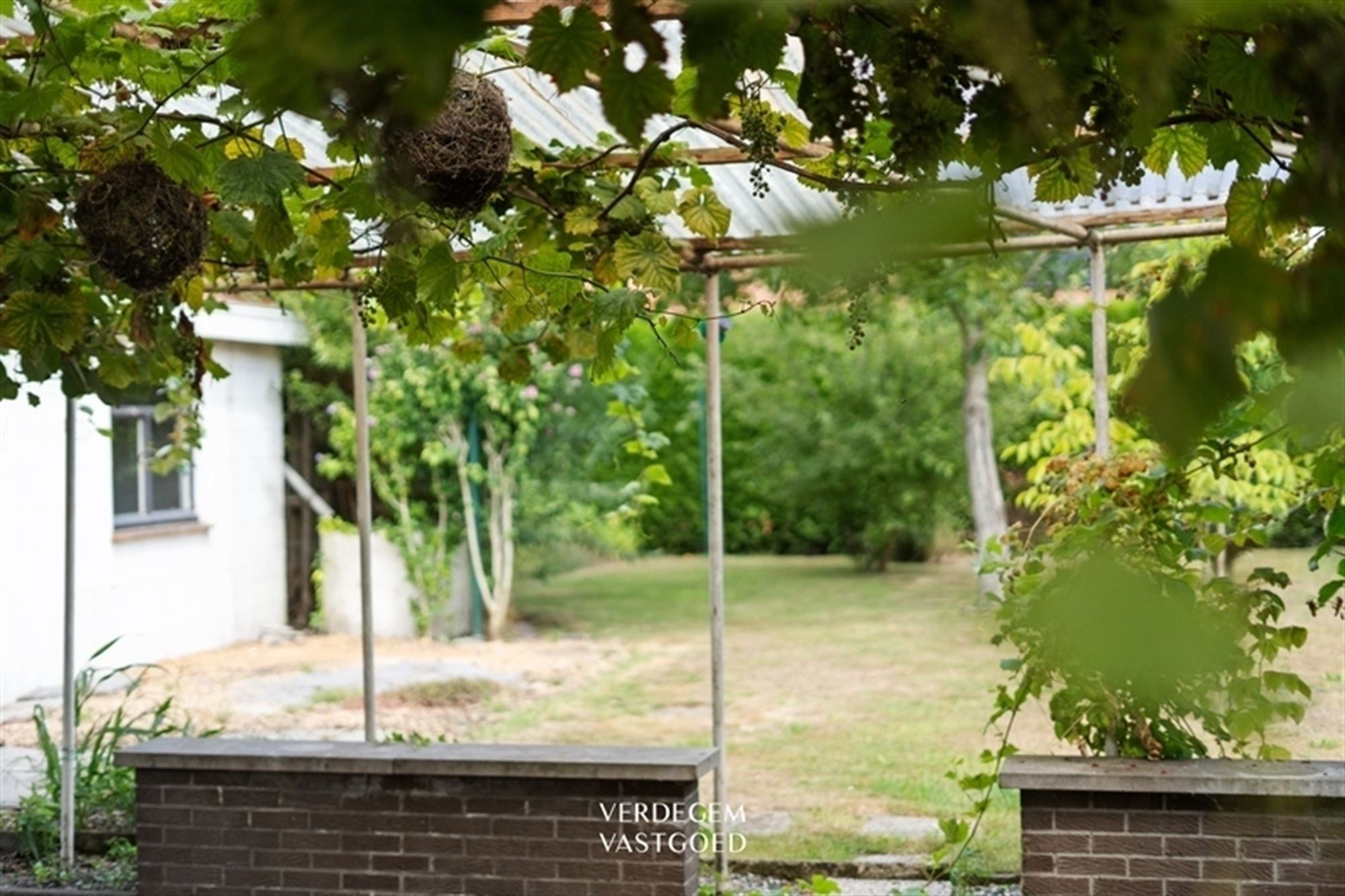 Karaktervolle woning met jaren '50 charme, 3 slaapkamers, garage en gezellige tuin foto 20