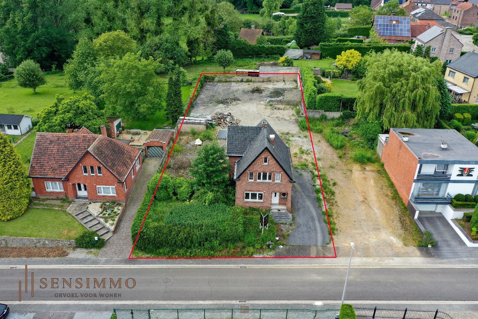 Open bebouwing met bouwgrond op 13a perceel incl. vergunde renovatieplannen foto 1