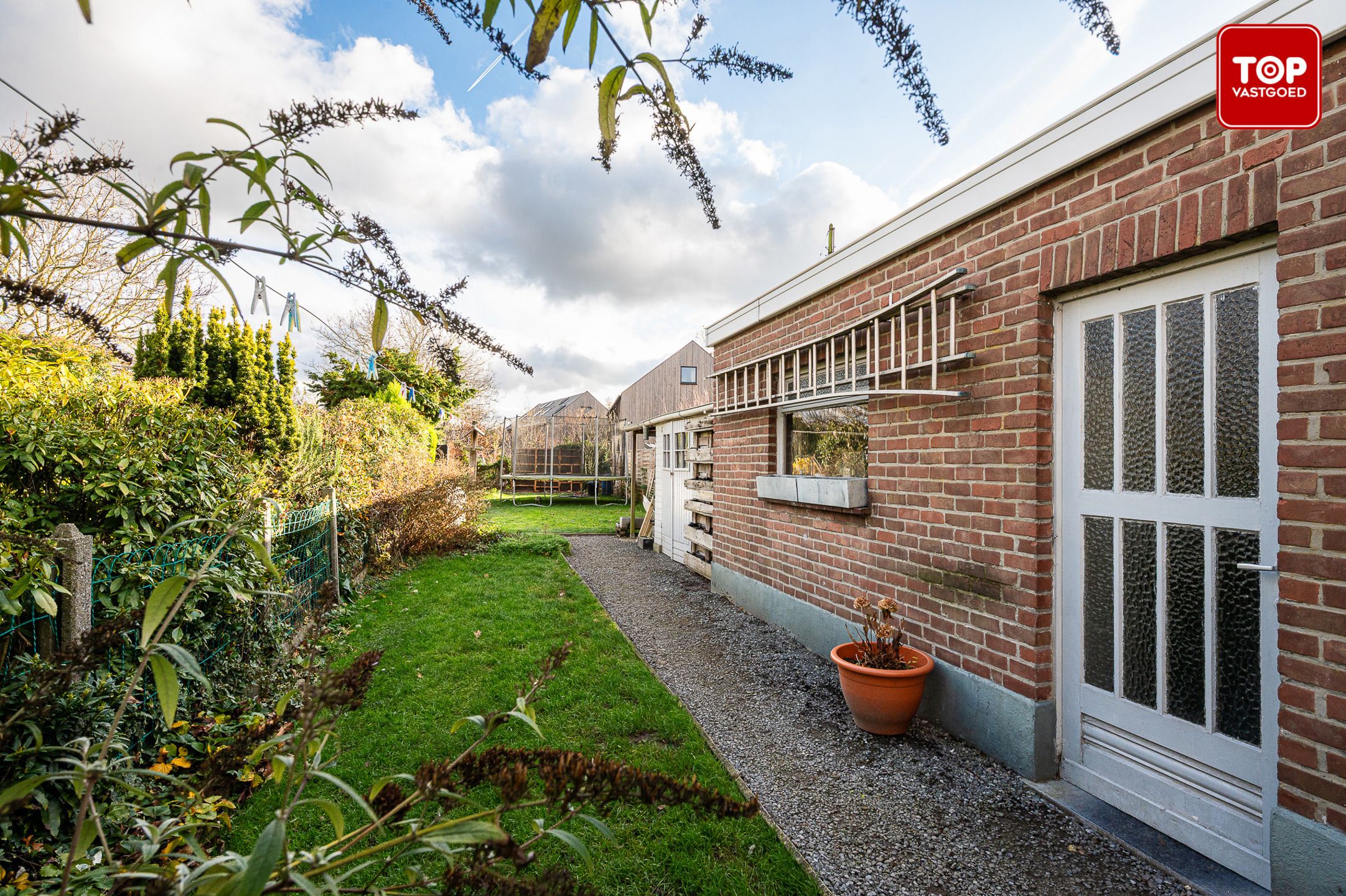 Instapklare woning met 5 slaapkamers en leuke tuin in centrum Drongen foto 24