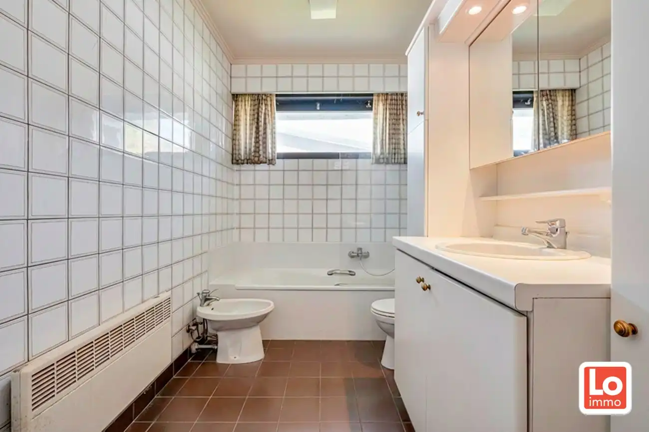 Architecturale gelijkvloerse open woning met inpandige garage op toplocatie nabij het centrum van Lochristi! foto 17