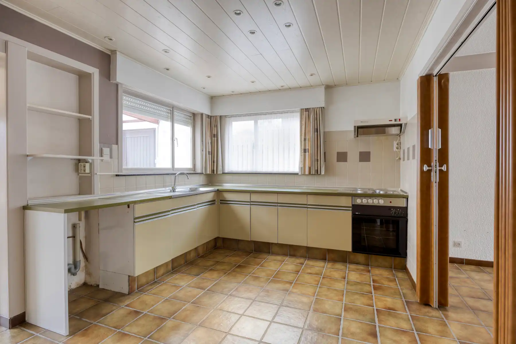 Woning met renovatiepotentieel in het centrum van Hechtel! foto 6