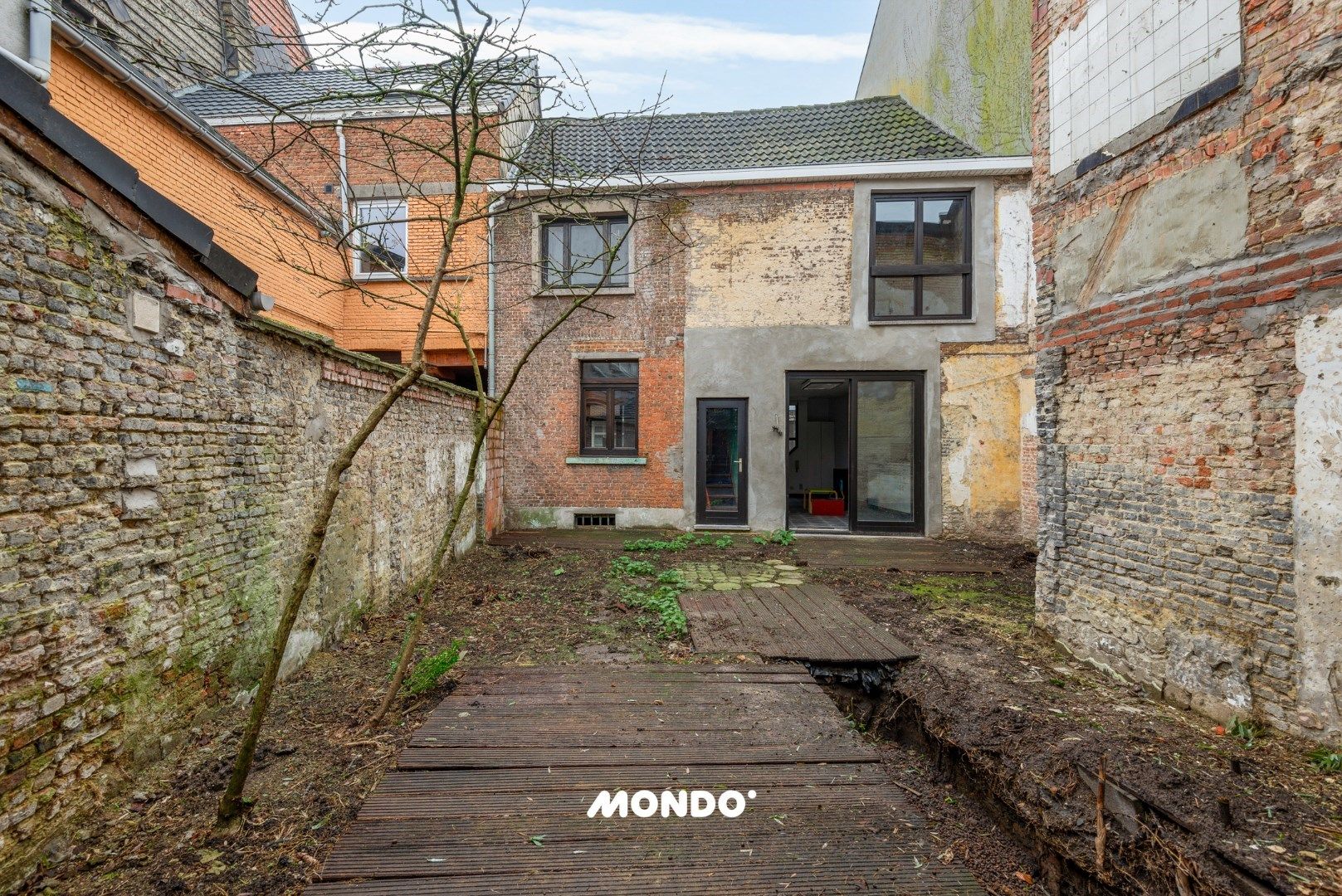 Woning met tuin en potentieel in het centrum van Niel foto 3