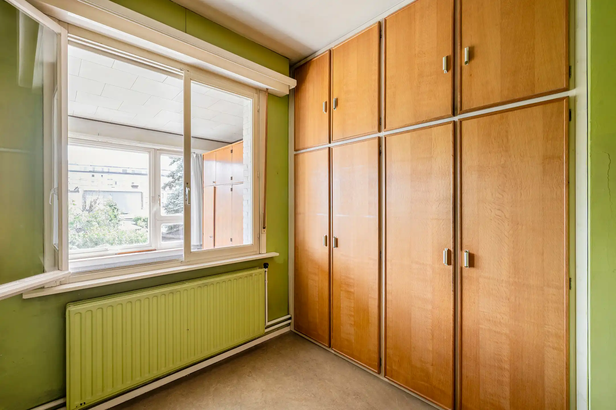 Te renoveren woning met garage én tuin foto 16