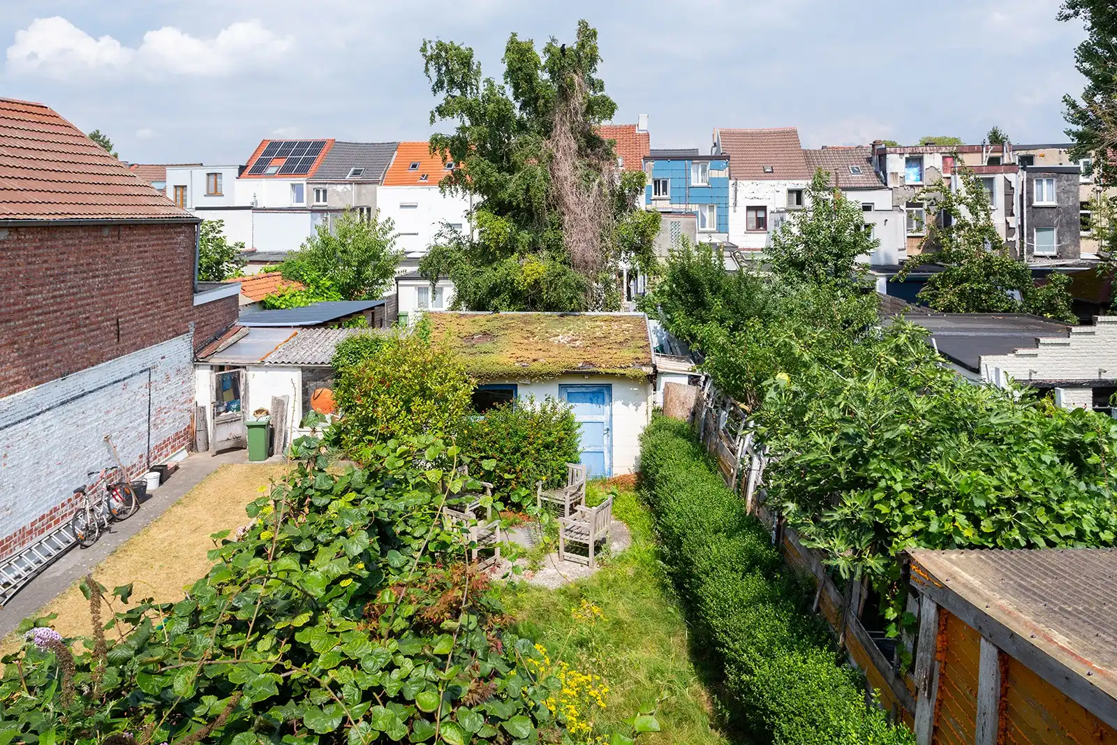 Lichtrijke bel-etagewoning met dubbele garage en ruime tuin foto 29