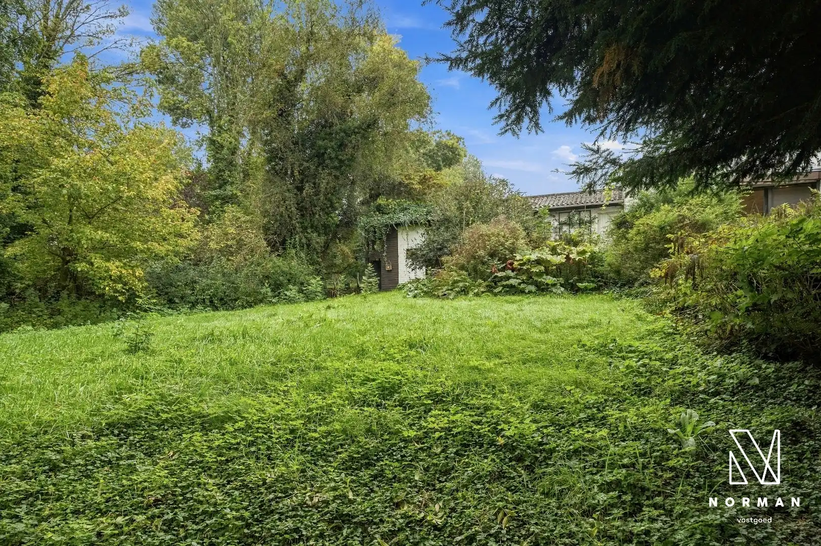 Gelijkvloerse woning op groene topligging aan het Heulebeekdomein in Kuurne met 4 slaapkamers, garage en ruime tuin te koop op perceel van +/- 1500 m²! foto 25