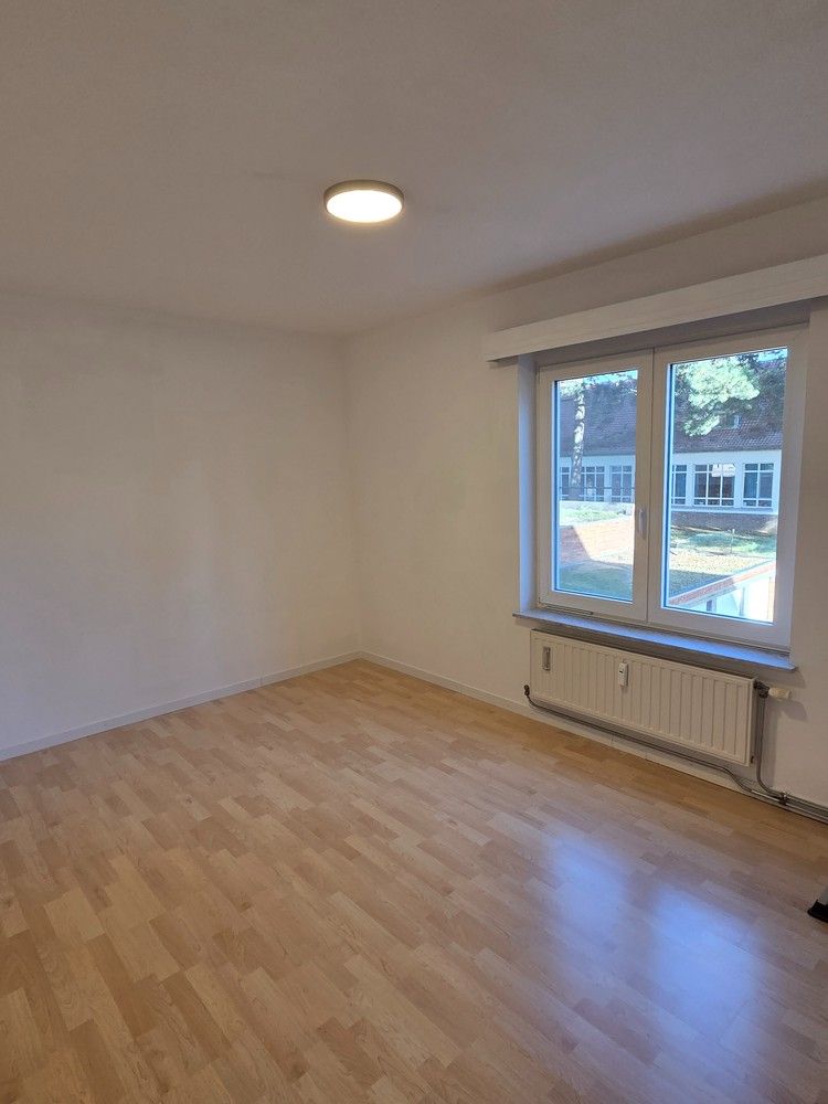 Gerenoveerd appartement met 2 slaapkamers, terras en garagebox te huur in Heverlee foto 7