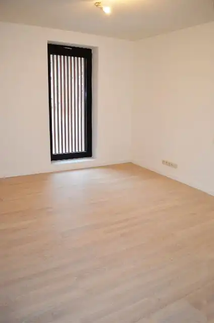 Gelijkvloers appartement met 2 slaapkamers, terras en tuin. foto 4