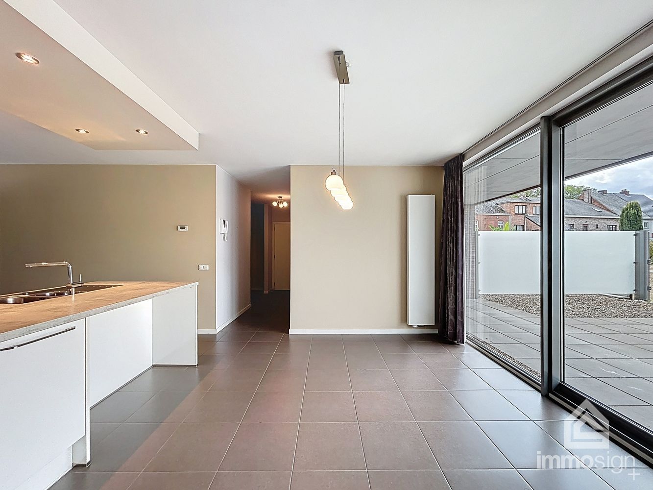 Ruim gelijkvloers appartement (118 m²) in hartje Bree met ruim terras (53 m²), grote kelderberging en extra brede staanplaats foto 16