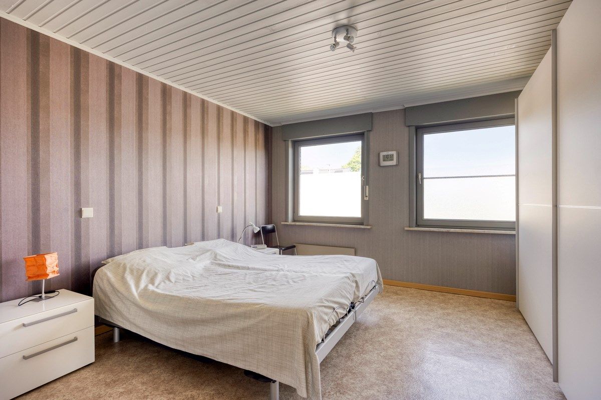 Halfopen bebouwing met 4 slaapkamers en grote tuin. foto 20