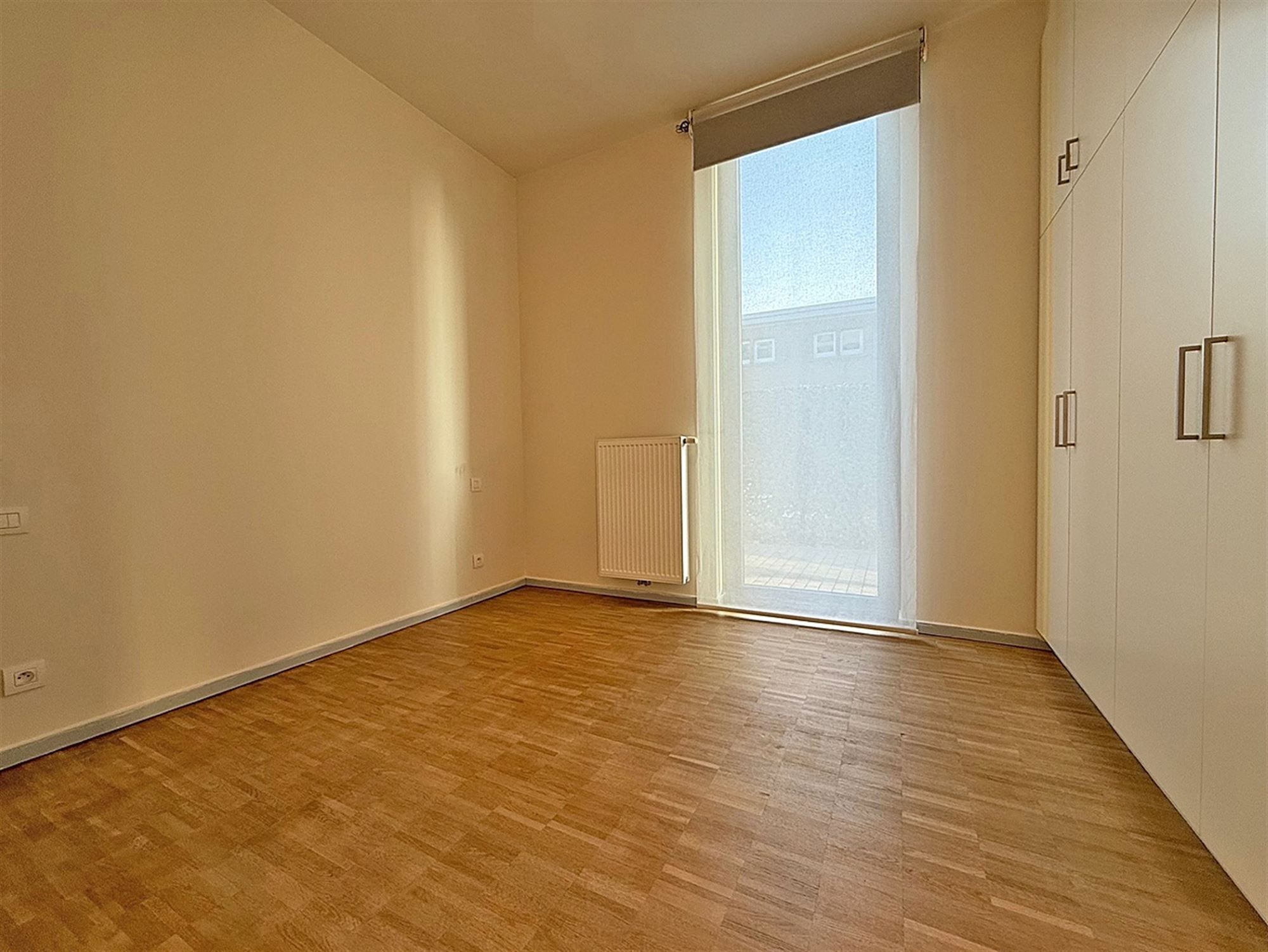 INSTAPKLAAR gelijkvloers APPARTEMENT met 1 slaapkamer, garage, buitenstaanplaats en terras foto 12