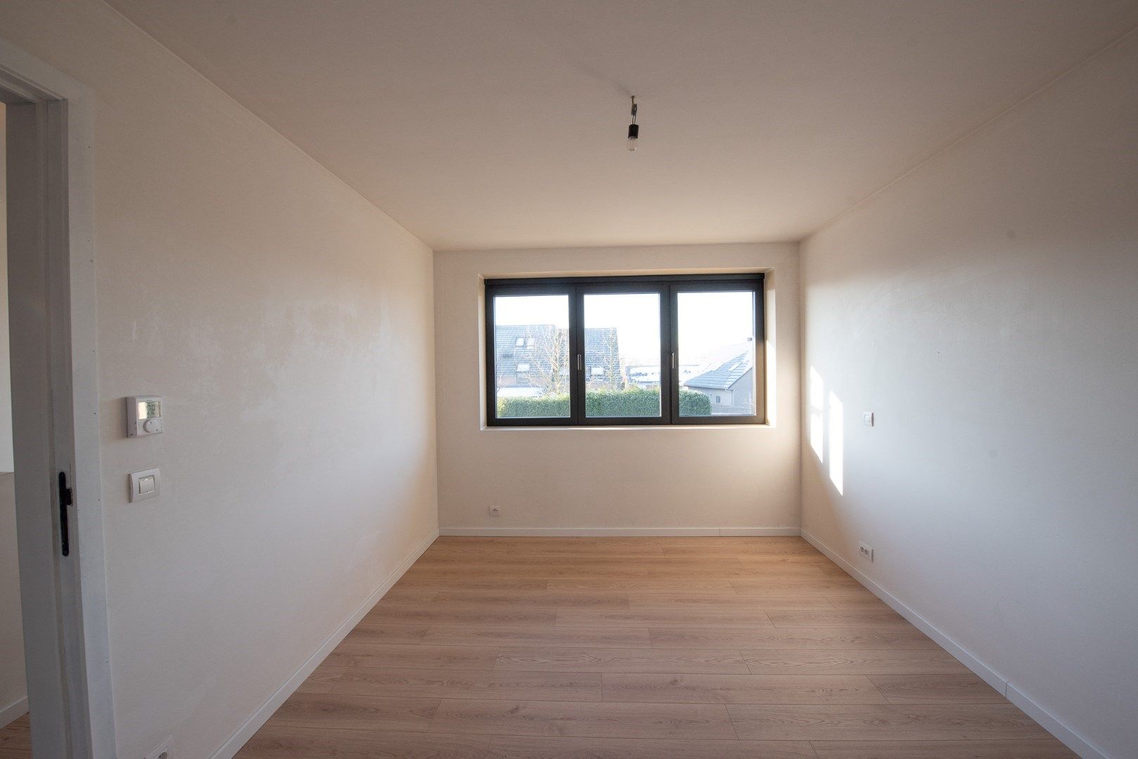 Nieuwbouwwoning met garage in Olsene foto 12