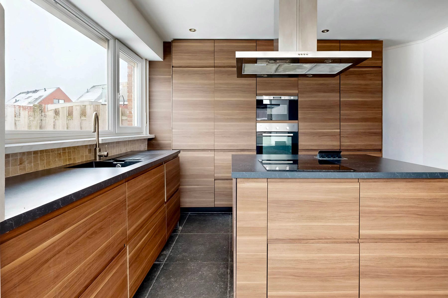 Halfopen bebouwing met 3 slaapkamers, garage en tuin foto 5