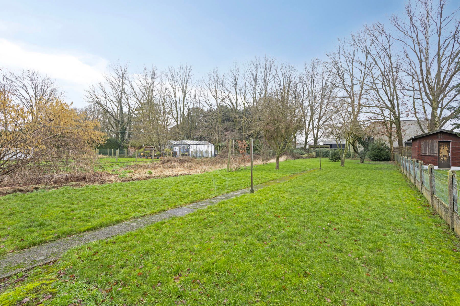 Gezinswoning met 3 slpk, grote tuin, garage en staanplaatsen foto 23