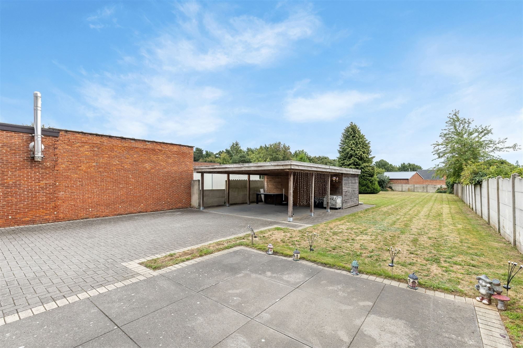 PERFECT ONDERHOUDEN GELIJKVLOERS APPARTEMENT MET 2 SLAAPKAMERS EN RUIME TUIN MET CARPORT EN BERGING TE HEUSDEN foto 23
