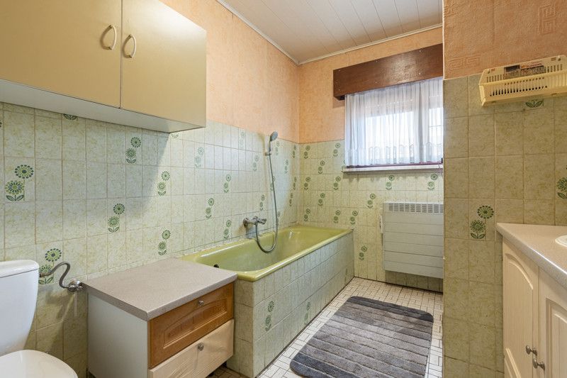 Gelijkvloerse woning met grote loods achteraan op 25are foto 29