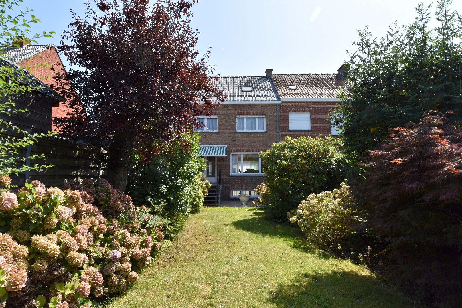 Rijwoning met 3 slaapkamers, garage en tuin te koop in een kindvriendelijke wijk te Kuurne foto 12