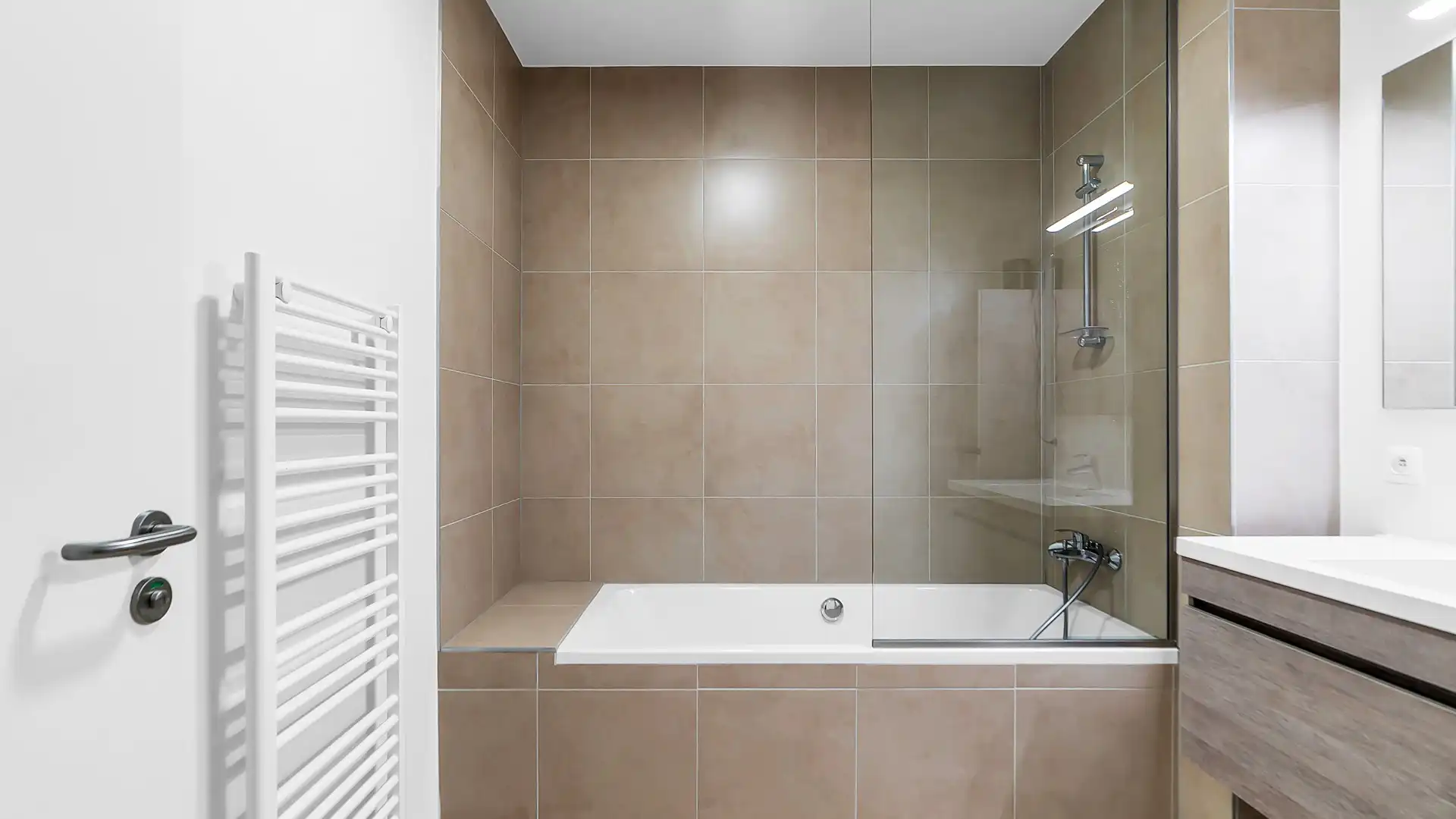 Instapklaar en energiezuinig appartement met 2 slaapkamers en 2 ondergrondse autostaanplaatsen foto 13