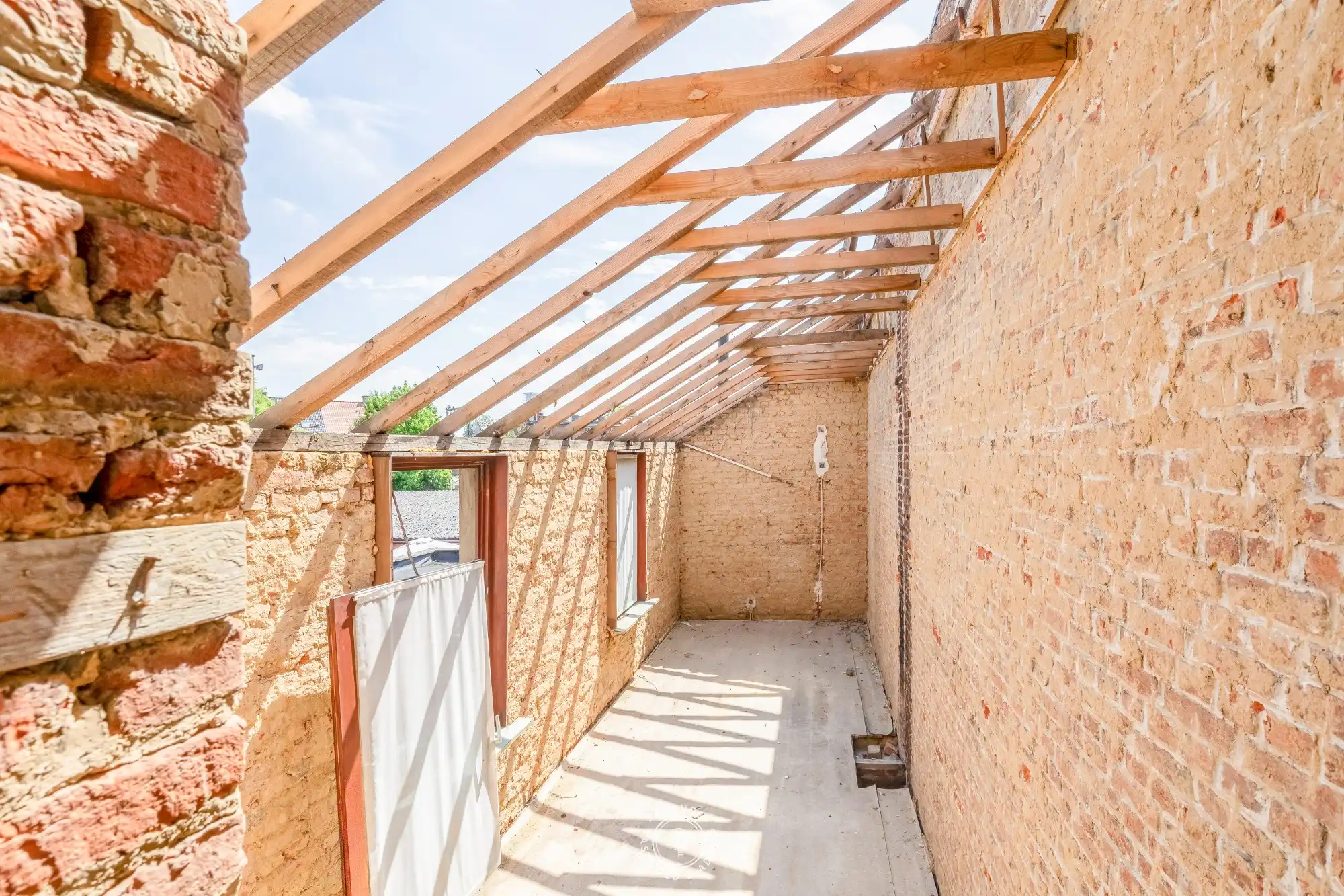 Te renoveren woning met garage in het centrum van Sint-Niklaas foto 9