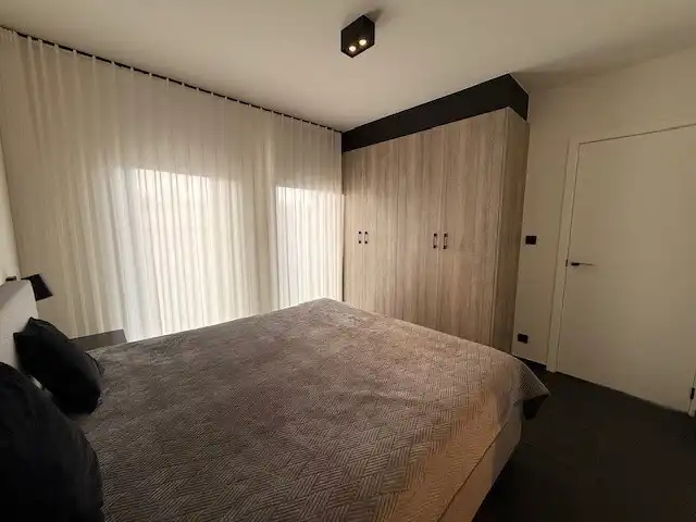 Nieuwbouwappartement met 1 slaapkamer, terras en autostandplaats te Maasmechelen. foto 11