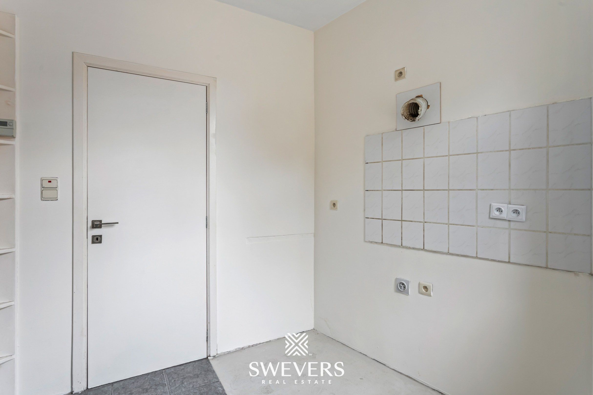 Charmante hoekwoning met potentieel in hartje Tongeren foto 8
