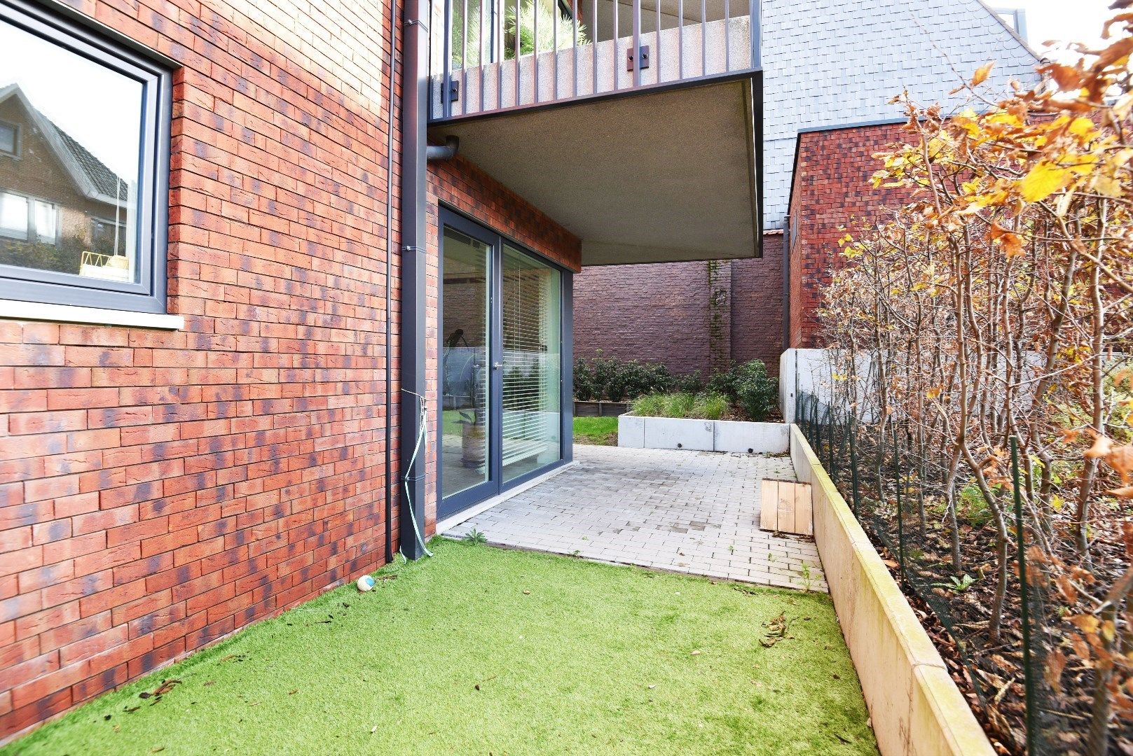 Gelijkvloers appartement met 2 slaapkamers en zonnige tuin te Maldegem centrum. foto 10