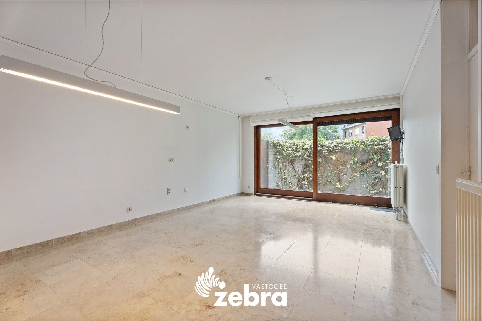 Veelzijdig handelspand op toplocatie in hartje Tielt – ook in te richten als woonst! foto 8