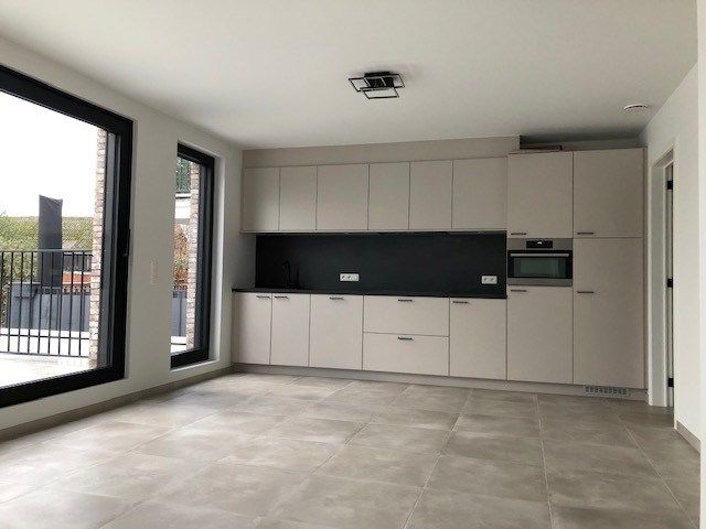 Stijlvol 2slpk appartement met terras en garage foto 4